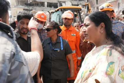 Saket Building Collapse: Rescue teams clearing debris after a five-story building collapsed in Delhi's Saket area, with emergency personnel conducting search and rescue operations.
