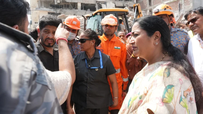 Saket Building Collapse: Rescue teams clearing debris after a five-story building collapsed in Delhi's Saket area, with emergency personnel conducting search and rescue operations.