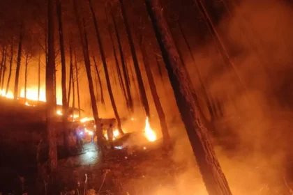 Uttarkashi Fire Incident tin shed colony after short circuit as firefighters try to control flames.