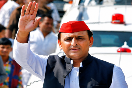 Akhilesh Yadav Prayagraj Visit: Samajwadi Party chief Akhilesh Yadav greets supporters during his grand welcome procession in Prayagraj with party workers and flower showers.
