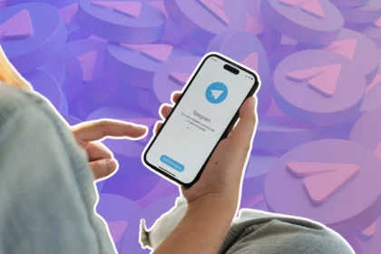 Telegram logo displayed on a smartphone with legal documents in the background, highlighting the Telegram Ban in India