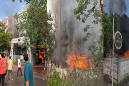 Indore EV Showroom Fire: Firefighters and local residents rescue people trapped above an electric vehicle showroom after a massive fire in Indore.