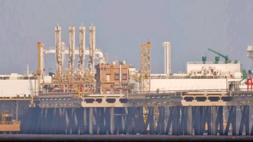 Iran US Peace Talks: Qatar LNG tanker sailing through the Hormuz Strait during Iran US peace negotiations in 2026