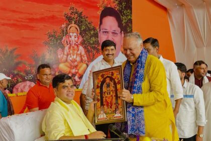 Shantanu Maharaj's Discourse: Kharkhoda immersed in devotion to Lord Ram on the second day of the Shri Ram Katha; devotees deeply moved by Acharya Shantanu Ji Maharaj's discourse.