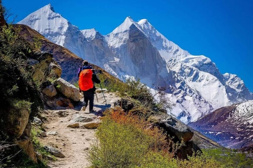 Trekking Routes GPS Mapping: Trekkers hiking on a mountain trail in Uttarakhand as authorities begin GPS mapping of major trekking routes