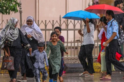 IMD Weather Update showing heavy rain alerts across 13 states and heatwave conditions continuing in Uttar Pradesh.
