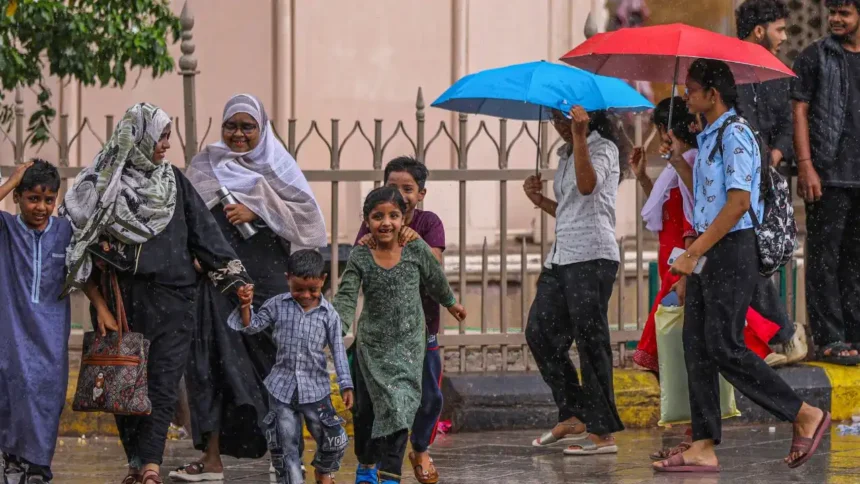 IMD Weather Update showing heavy rain alerts across 13 states and heatwave conditions continuing in Uttar Pradesh.