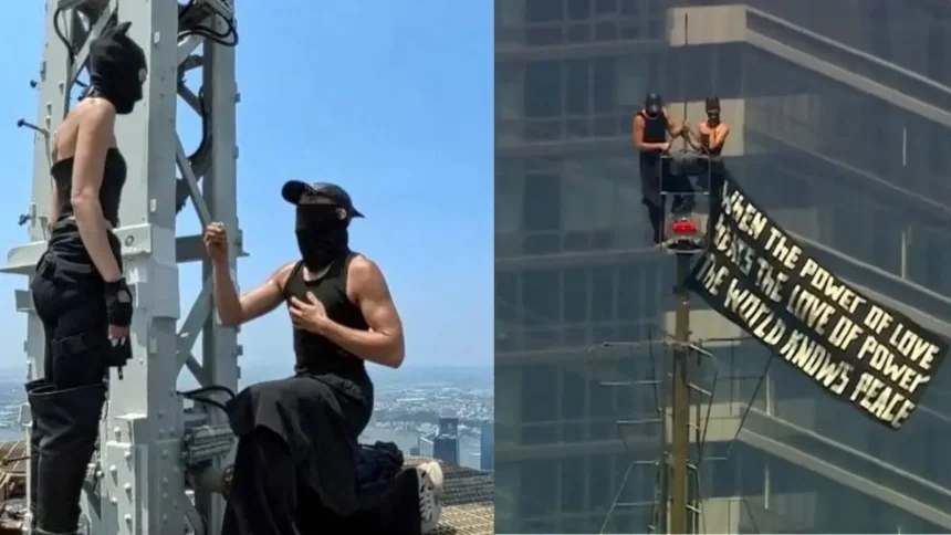 Empire State Proposal Viral Video: Russian couple proposes on top of the Empire State Building spire without safety gear in viral video.