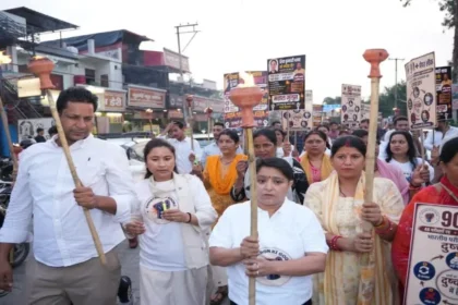 NEET Paper Leak Protest: Congress workers and students participate in the NEET Paper Leak Protest candle march for Riya Thapa in Dehradun, demanding justice and transparent examination reforms.